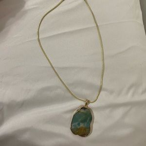Gold necklace with real crystal